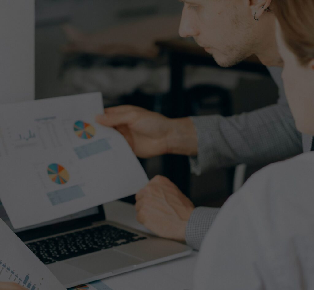 sales people looking over enablement tools