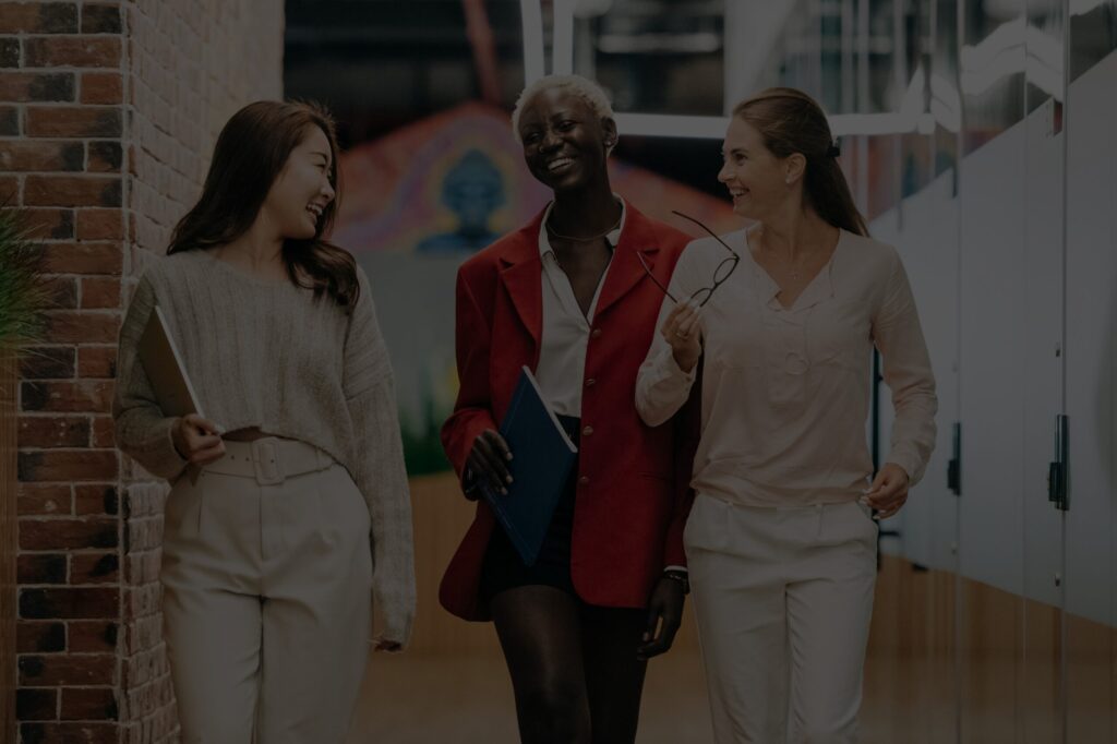 Three confident executives working as a team, ready for their Orals presentation.